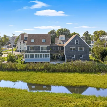 FULLY RENOVATED apt w/water views and deck near beach& marina