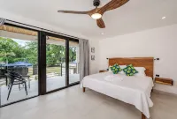 Gated + Lux +New Modern 4-BD Home in Playa Potrero – AC, WiFi & Steps to  Beach! - Villas