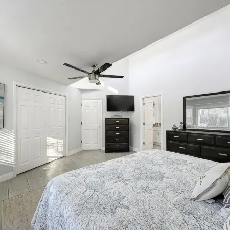 Four Beds, three baths, heated pool, and a Golf Course. What more do you need!!