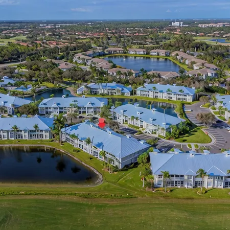 Rare NEW 2/2 Condo in Naples with Lake & Golf View! Home Away from Home