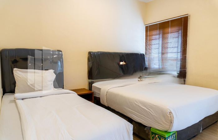 Adam Malik Guesthouse Near Regale ICC Medan Mitra RedDoorz