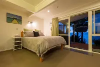 By the Bay Beachfront Apartments Hotels in Taipa