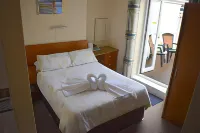 Harrington Guest House Hotel berhampiran Porth Beach