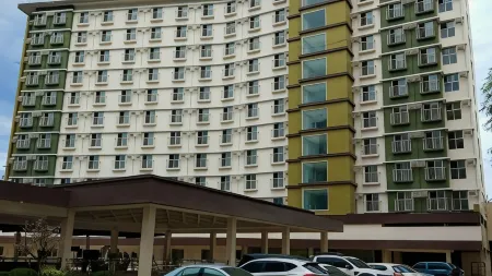 Cozy Place at Bamboo Bay Cebu Отели рядом с достопримечательностью «Себу Докторс Юниверсити»