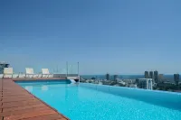 Modern Ocean View 1BR in La Esperilla, Pool, Gym Hotels in 