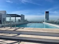 Premium 1BR Condo in New Kingston - สระว่ายน้ำส่วนตัว