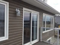 Main Floor (Unit 1) in House, Deck, Sunset, Water View (Cheticamp Harbour) Hotels in Chéticamp