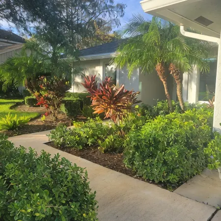 Golf cart distance to WEF! Charming 3 bedroom waterfront home with heated pool.