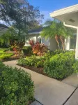 Golf cart distance to WEF! Charming 3 bedroom waterfront home with heated pool. - 3-Star
