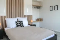 Close to Downtown, with a Balcony, Parking Space, and Charging Station - 4-Star
