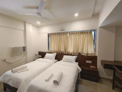 Astha Residency Hotels near Shree Mayakka Devi Mandir