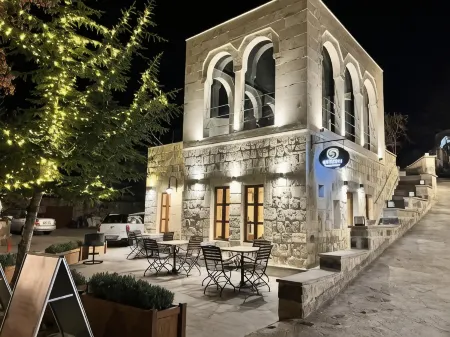 Sinasos Evleri Отели в г. Karlik Koyu