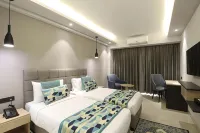 Ahuja Residency Mayfield Garden Hotels near Gurugram University
