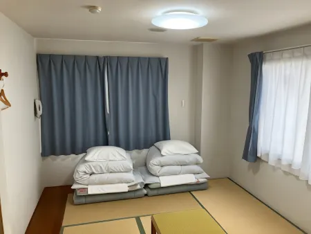 Business Hotel Yukuhashi Отели рядом со станцией JR Obase Nishikodai-mae station