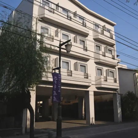 Purple Hotel Futsukaichi Отели в г. Тикусино