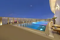 The Curve Hotel - Bãi biển