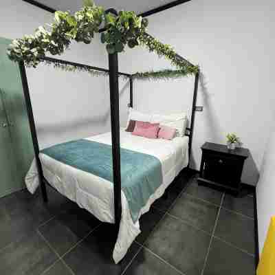 Cozy Alajuela SJO in charming Alajuela with WiFi, AC VOLCANO ALSACIA Rooms