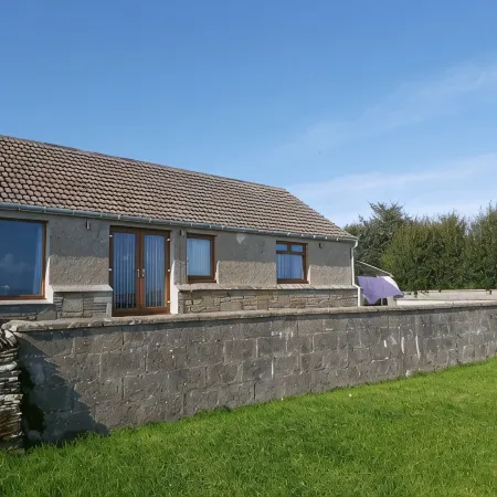 Bungalow with sea-view, near small town of Thurso.