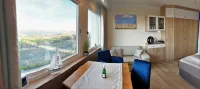 Your apartment with a wonderful panoramic view of the Burgtiefe marina - 3-Star
