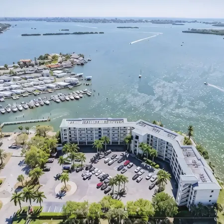 Top-Floor Waterfront Condo with Bay View + Pool and Hot Tub
