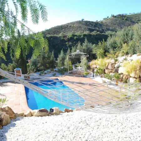 3 bed villa surrounded with tropical gardens with private pool 2 km from town.