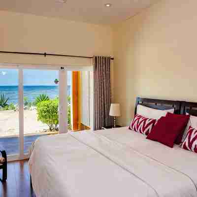 SAND Luxurious Tranquility on a Private Beach In A Protected Marine Environment Rooms