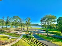 Escape to “Studio A Lake, Pool, Splash Pad, Hot Tub, Kayaks, Fire Pit, Etc - 4-Star