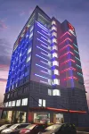 G Suites Hotel by Amithya فنادق في Gubeng
