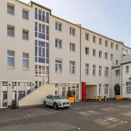 Townhouse Düsseldorf Отели рядом с достопримечательностью «Площадь Карлсплац»