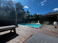 Modern vacation bungalow in the Neuhof forest settlement on the Großer Wünsdorfer See lake Hotels in Zossen