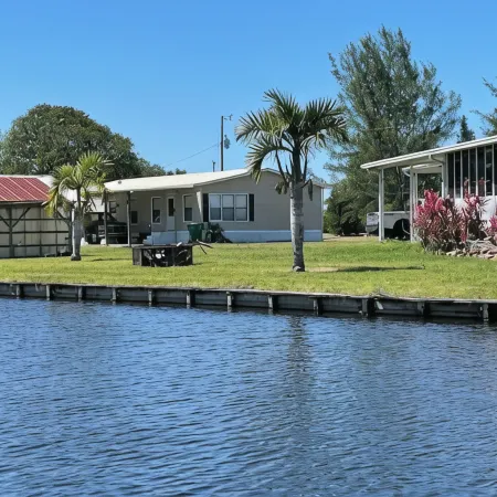 2 houses, 2 boat slips boat ramp,