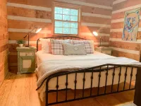Cozy Cabin in woods with Hot Tub, Porch Swing Bed and Fire Pit in Aska Adventure - 3-Star