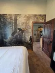 Themed Bear's Den Cabin__nestled in the pines minutes outside of Glacier Park.