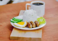 Casa Isabel Hostel - servizio colazione