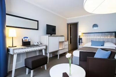 Hotel Neptun Отели рядом с достопримечательностью «Ostseebad Warnemunde»