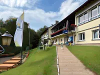 Hotel-Restaurant Berghof Отели в г. Альценау