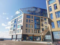 Novotel Arkhangelsk (Новотель Архангельск) Отели рядом с достопримечательностью «Соломбала МОЛЛ»