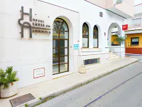 OYO安達盧薩海岸酒店 莫特里爾酒店