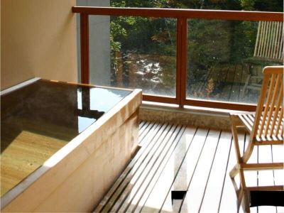 デラックス　ツインルーム　露天風呂付 扉温泉明神館の写真