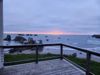 Coastal Elegance: Pet-Free Oceanfront One Level Home with Sweeping Views