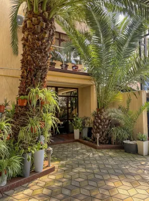 Tri Palmy Hotel - بيوت ضيافة