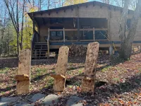 Riverside cabin in the woods