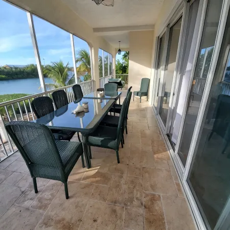 5Br Luxury Home w/ Pool, Theater, Rooftop Deck & 100-ft Dock Near Beach!