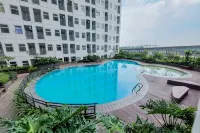 Fully Furnished with Cozy Designed 2Br Serpong Garden Apartment by Travelio - Gym