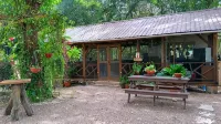 Private forest view cabin w/AC, 2 beds-restaurant and car rental on site.