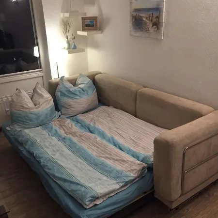 Spacious beach apartment in a quiet location with pool and sauna