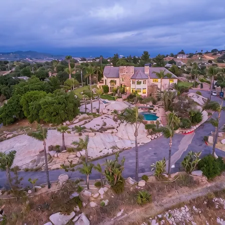 Castle on a hill, breathtaking views, surrounded with pools, trees, and lawn