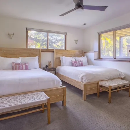 Dreamy home on river, mountain views, steps from town.