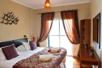 Magos Sunrise - Apt with Sea View - Butik