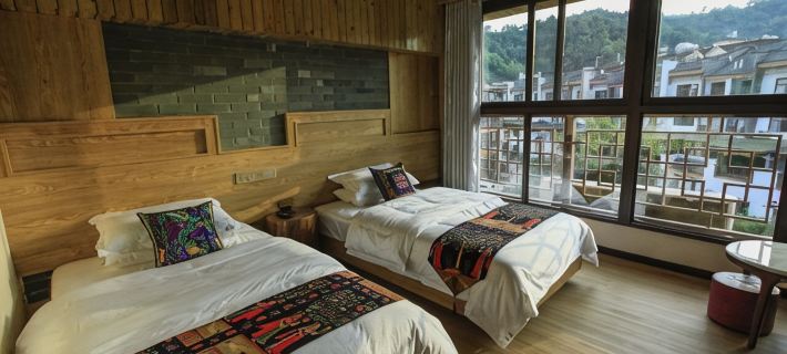 Mojiang Xile Inn Отели в г. Моцзян